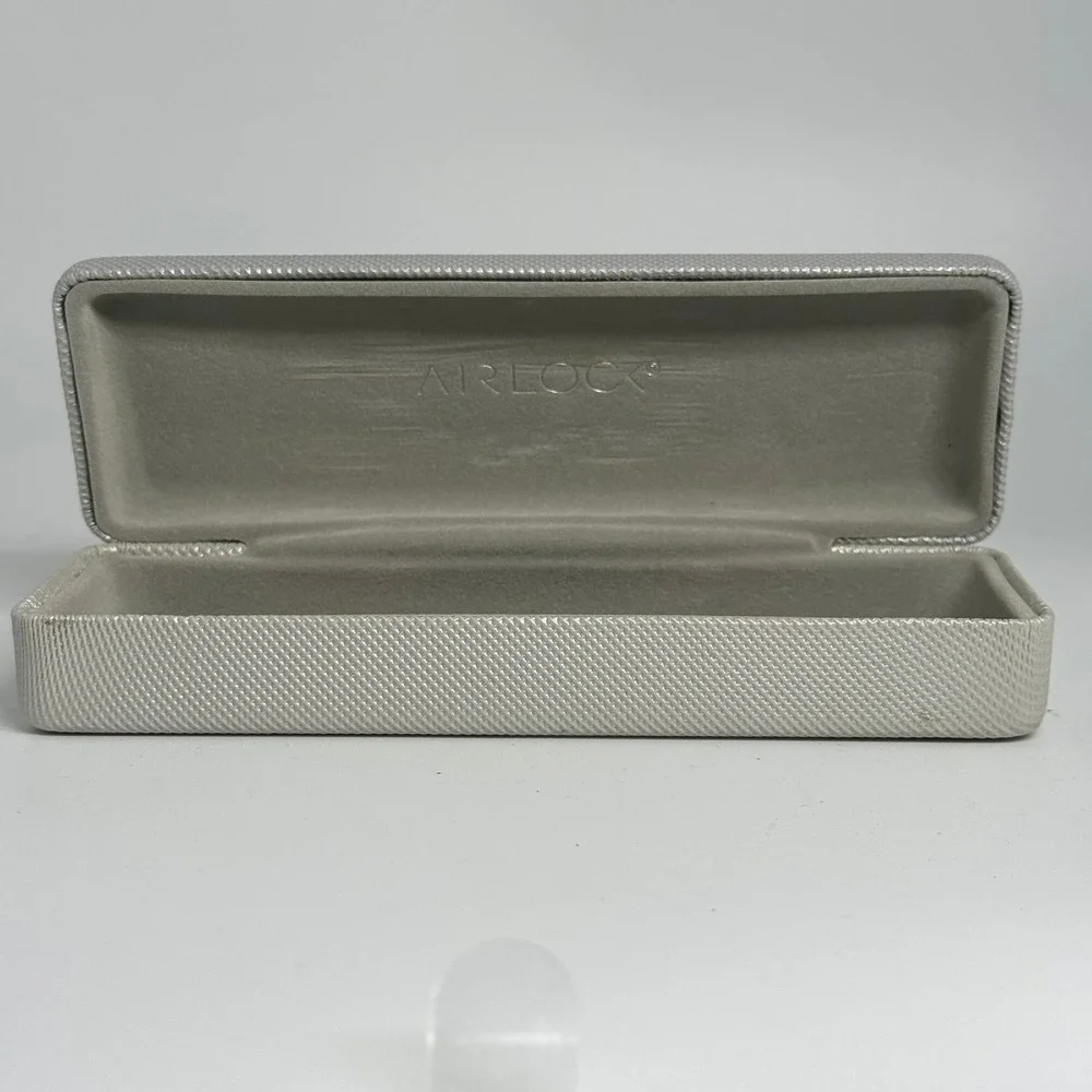 Airlock Silver Textured Hard Shell Eyeglass Case Metallic Gray Interior Slim